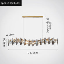 Load image into Gallery viewer, Zoey Oval Cut Smokey Crystal And Copper Bar Chandelier
